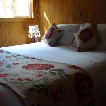Hostal Lago Condor ปวยร์โตนาตาเลส ภายนอก รูปภาพ