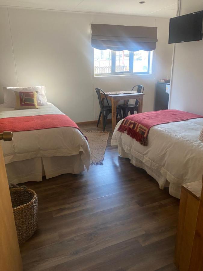 Hostal Lago Condor ปวยร์โตนาตาเลส ภายนอก รูปภาพ