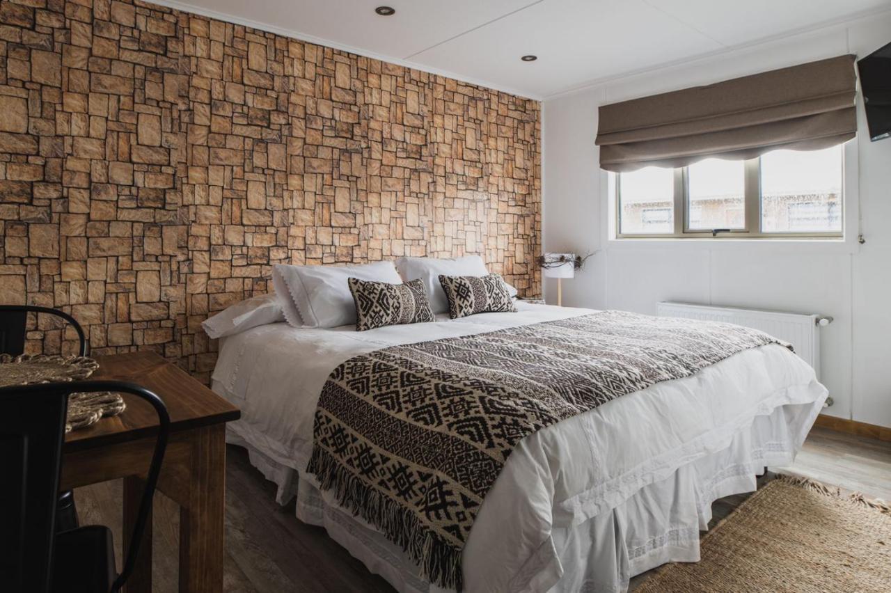 Hostal Lago Condor ปวยร์โตนาตาเลส ภายนอก รูปภาพ