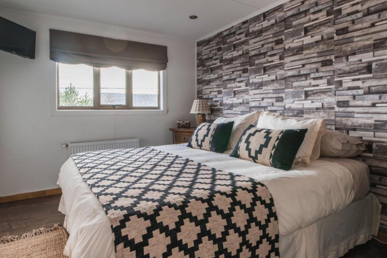 Hostal Lago Condor ปวยร์โตนาตาเลส ภายนอก รูปภาพ
