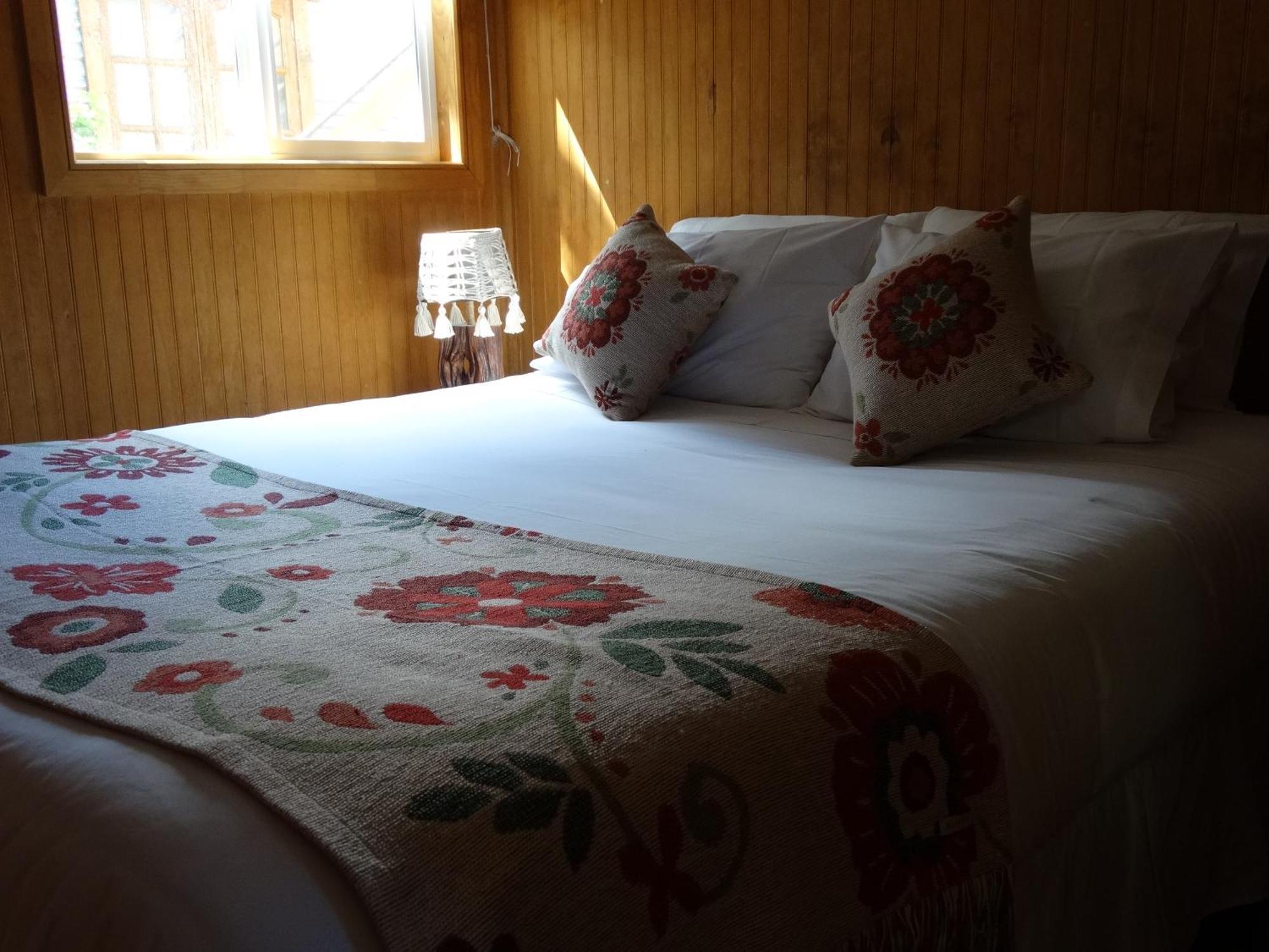 Hostal Lago Condor ปวยร์โตนาตาเลส ภายนอก รูปภาพ